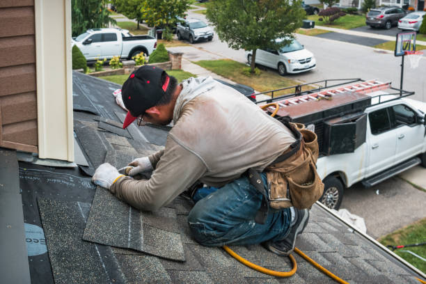 Professional Roofing technician working in Ludlow, MA